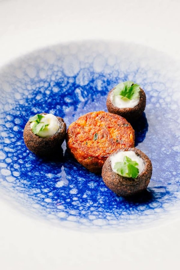 Qual è il segreto per un polpettone ripieno di spinaci e mozzarella filante?